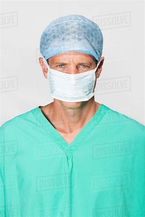 Portrait of a surgeon in mask - Stock Photo - Dissolve