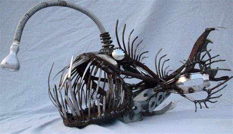 Scrap metal angler fish sculpture with working light