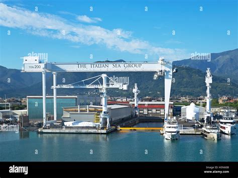 The industrial port at Marina di Carrara, Tuscany, Italy Stock Photo ...