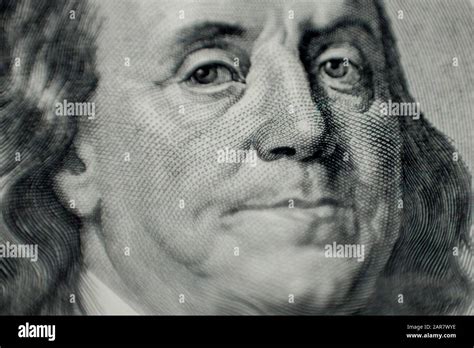 Portrait of Benjamin Franklin macro from one hundred dollars bill. Benjamin Franklin on 100 ...