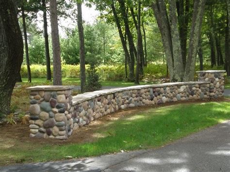 Image result for river rock fencing and parking areas | Stone walls ...