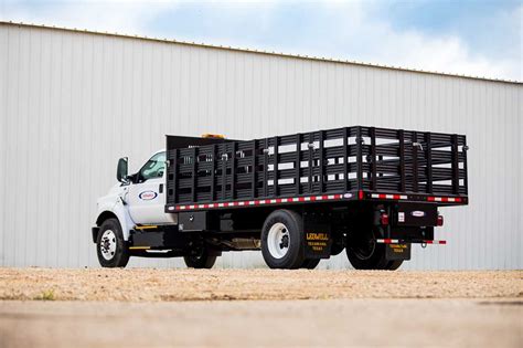 Stake Bed Trucks | Haul Heavy Loads with a Ledwell Stake Bed Truck