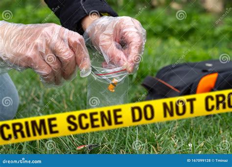 Police Detective Collecting Evidence at Crime Scene Stock Photo - Image of collect ...