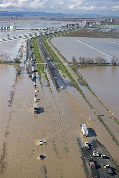 Photos: California storms cause flooding, downed trees and sinkholes