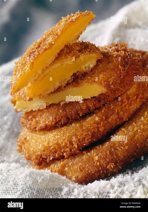 sliced mango covered in coconut and deep fried Stock Photo - Alamy