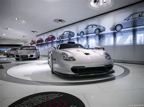 Take A Tour Of The Stunning Porsche Museum | Car showroom architecture, Porsche, Car showroom design