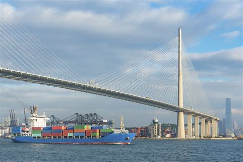 Container ship and bridge stock photo. Image of container - 104374416