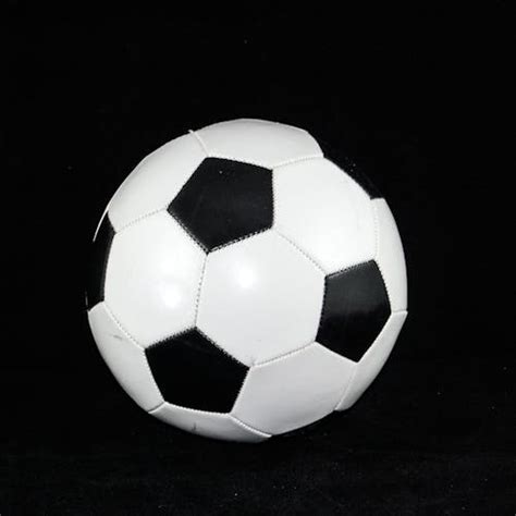 Soccerball on Wide Green Grass Field · Free Stock Photo