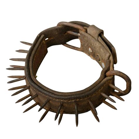 reallifeishorror:19th century spiked metal wolf collar, worn by sheep herding dogs or dogs guarding