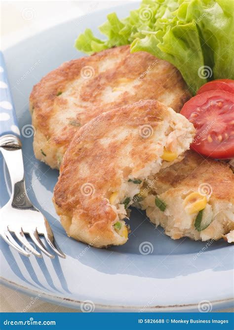 Cod and Salmon Fish Cakes with Corn and Salad Stock Photo - Image of salmon, food: 5826688