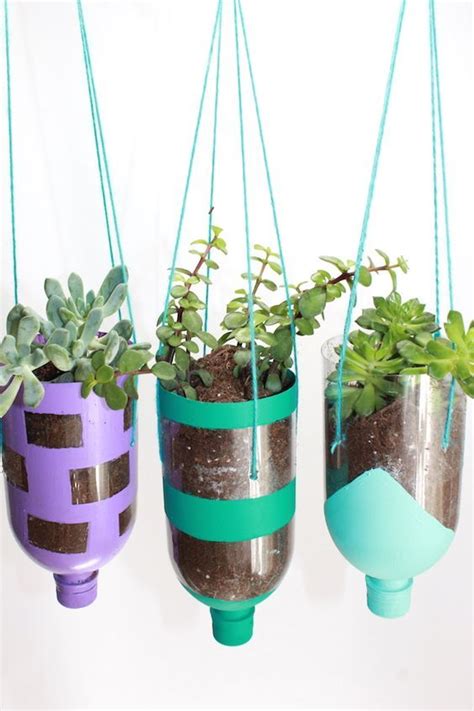 21 DIY Hanging Planters YOU Can Make - Make and Takes | Diy hanging planter, Plastic bottle ...