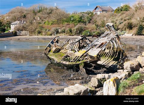 Remains of an abandoned boat at Hooe Lake Plymstock Plymouth Devon England UK Stock Photo - Alamy