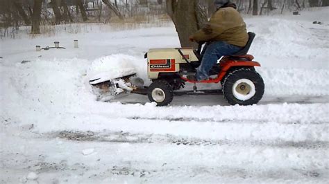 Old Gilson garden tractor plowing snow 3. - YouTube