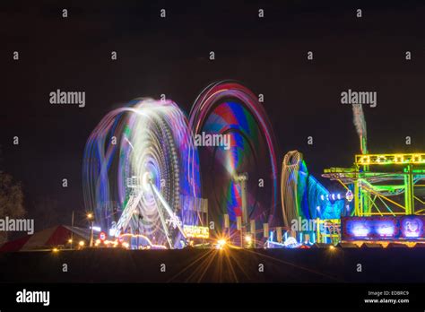 Fairground rides at Winter Wonderland, Hyde Park, London create a ...