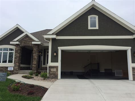 dark grey stucco exterior, white trim, nice stone entrance MABA Parade 2014 | House paint ...