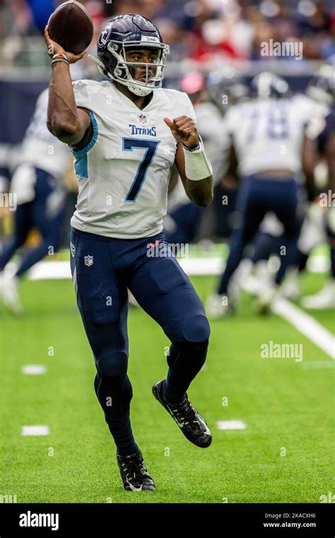 Tennessee Titans quarterback Malik Willis (7) making his NFL debut rolls out to pass during the ...