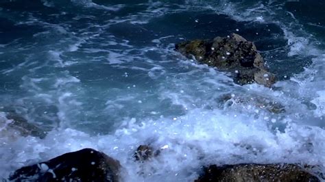 Ocean waves crashing rocks Stock Video Footage - Storyblocks