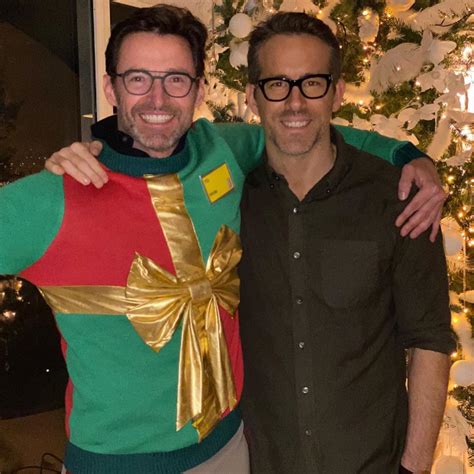 Ryan Reynolds and Hugh Jackman bring back their feud with Christmas Day sweater in these photos ...