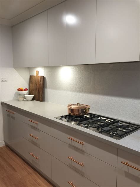 Our new kitchen! Clamshell Caesarstone, cabinetry in Dulux 'limed white quarter', splashback ...