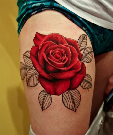 Very realistic colored and detailed big rose tattoo on thigh - Tattooimages.biz