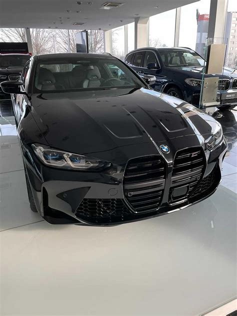 New photos of the 2021 BMW M4 in Sapphire Black Metallic