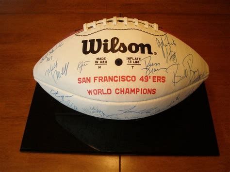 This autographed San Francisco #49ers World Champions football features the signatures of some ...