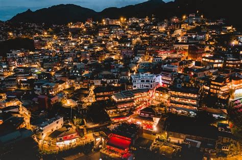 Premium Photo | Aerial view of night scene of jioufen village taiwan ...