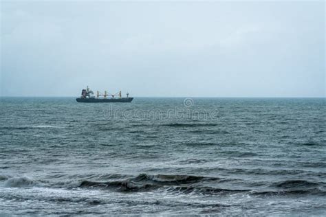 Empty Cargo Container Ship with Cranes Sailing in a Rough Ocean during Stormy Weather, Gandia ...