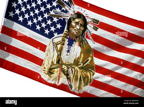 American flag with an image of a Native American Indian holding a peace pipe Stock Photo - Alamy