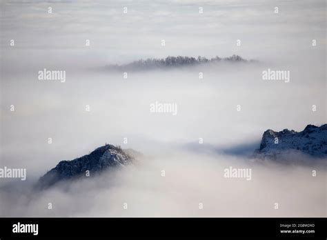 Mountain sunset above clouds Stock Photo - Alamy