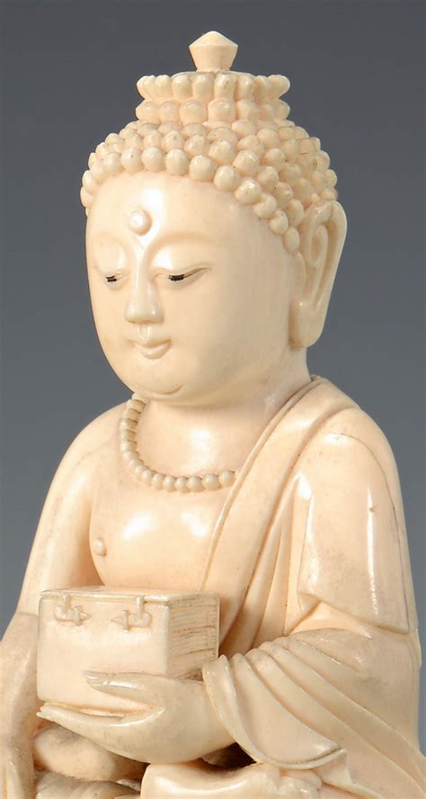 Lot 24: Antique Ivory Buddha