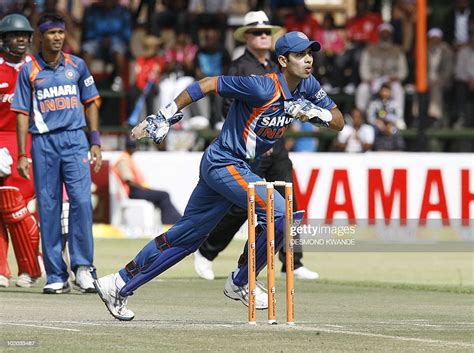 Indian wicket keeper Naman Ojha runs to secure the wicket stopping ...