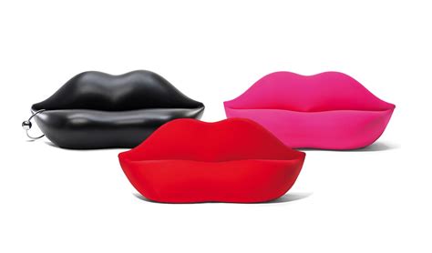 The Rich History Behind Studio 65's Iconic Lips Sofa | Architectural Digest