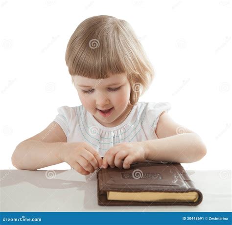 Smiling Little Girl Opening a Book Stock Image - Image of hand, serious ...