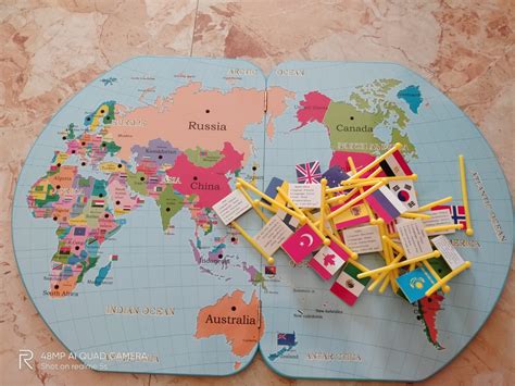 Wooden world map with Flag