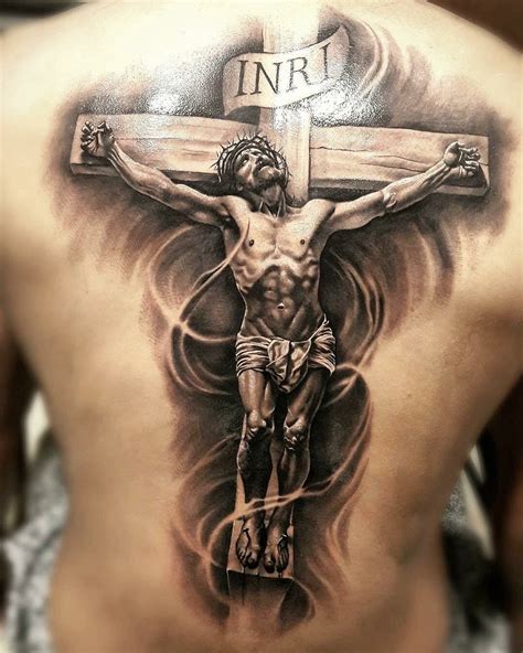 Pin on tattoos inked | Jesus tattoo, Crucifix tattoo, Christian tattoos