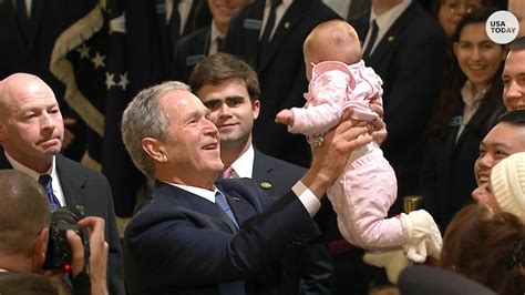 George HW Bush: George W Bush made a surprise visit to the Capitol