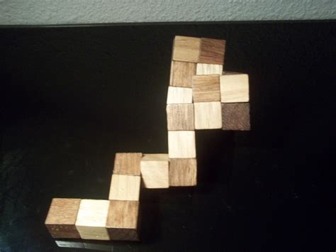 Casse-tête : le snake cube 3x3x3 en bois et sa solution – Le blog de ...