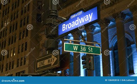 Broadway Street Sign at Night Stock Photo - Image of park, bridge ...