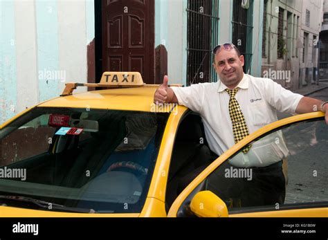 Official Tourist Taxi & Taxi Driver in Uniform in the Back Streets of ...