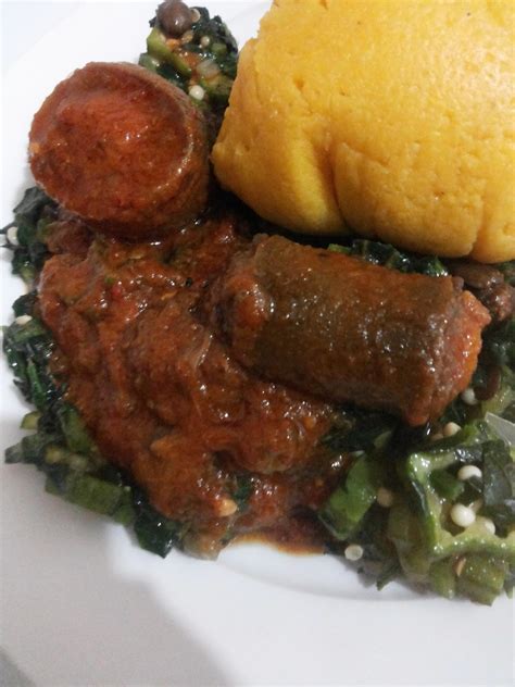 Ugu Okro Soup Served With Stew And Corn Flour Fufu