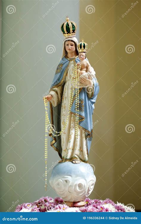 Statue of the Image of Our Lady of the Rosary Stock Photo - Image of catholic, owner: 196336244