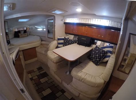 The interior of this 340 Sundancer is the typical express cruiser layout. Sea Ray adds upscale ...