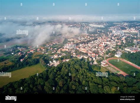 Aerial view of european city with architecture buildings and streets. Central square of small ...