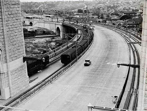 Sydney Harbour Bridge approach in 1932 looking north over the North Shore with the trains on the ...