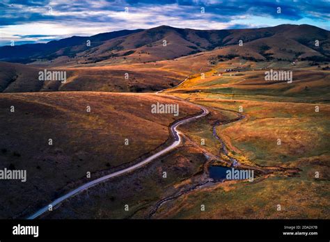 Aerial view of beautiful Zlatibor region landscape with asphalt road ...