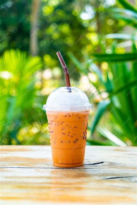 Premium Photo | Iced thai milk tea cup