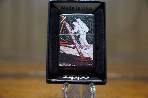 NORMAN ROCKWELL THE FINAL IMPOSSIBILITY MAN'S TRACKS ON THE MOON ZIPPO LIGHTER for Sale ...