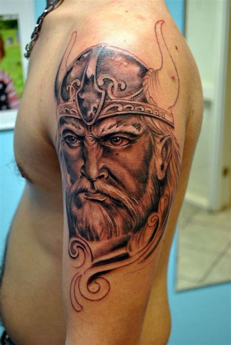 Severe Viking warrior tattoo on shoulder - Tattooimages.biz