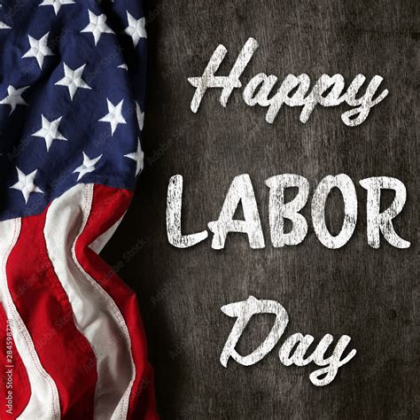 US American flag on worn black background. For USA Labor day celebration. With Happy Labor Day ...